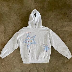 Hollister Co. hoodie with custom-cut, hand-crafted star appliqués